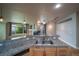 Granite countertops and stainless steel appliances in this kitchen at 1735 N Ogden St # 303, Denver, CO 80218