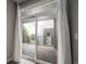 Private patio accessible through sliding glass doors at 1735 N Ogden St # 303, Denver, CO 80218