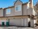 Exterior view of townhouse with double garage at 9993 E Mexico Ave, Aurora, CO 80247