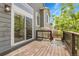 Wooden deck with railing and sliding glass doors to the house at 8935 Sleepy Grass Ct, Parker, CO 80134