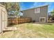 Backyard with a shed and fencing near the home at 8935 Sleepy Grass Ct, Parker, CO 80134