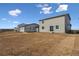 Spacious backyard graded and ready for custom landscaping, situated between neighboring homes at 5718 Ranch St, Mead, CO 80504