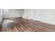 Open-concept living room features hardwood floors and plenty of natural light at 5718 Ranch St, Mead, CO 80504