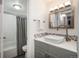 Updated bathroom with a vessel sink, mosaic tile backsplash, and modern fixtures at 800 N Pearl St # 707, Denver, CO 80203