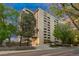 Building exterior at dusk, showcasing landscaping and building facade at 800 N Pearl St # 707, Denver, CO 80203