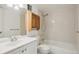 Clean bathroom featuring a shower-tub combo and a single sink vanity at 2453 S Xanadu Way # C, Aurora, CO 80014