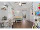 Dining room with hardwood floors, built-in bench seating, and view of the kitchen at 4543 Columbine St, Denver, CO 80216