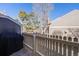 Cozy back patio with a grill and a view of the yard is perfect for outdoor dining at 2022 S Helena St # G, Aurora, CO 80013