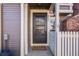 Inviting front door with a 'Welcome' mat and a secure entrance at 2022 S Helena St # G, Aurora, CO 80013