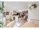 Open layout connects the kitchen and living room, bathed in natural light at 2022 S Helena St # G, Aurora, CO 80013