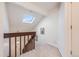 Loft area with skylight and view of the lower level at 2022 S Helena St # G, Aurora, CO 80013