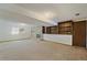 Cozy living room features a classic brick fireplace and built-in shelving for storage and decor at 14453 W 3Rd Ave, Golden, CO 80401