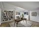 Home office with a modern desk setup, built-in shelving, and natural light for a productive workspace at 14453 W 3Rd Ave, Golden, CO 80401