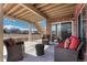 Cozy outdoor space with comfortable seating that has a view of the landscape and the community at 4883 S Sicily St, Aurora, CO 80015