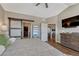 Inviting main bedroom with a walk-in closet and comfortable modern furniture at 4883 S Sicily St, Aurora, CO 80015