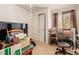 Bedroom with a double window, closet and a warm, welcoming carpet at 21396 E Prentice Ln, Centennial, CO 80015