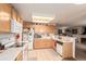 Efficient kitchen design offers modern appliances, ample counter space, and an open layout for easy entertaining at 21396 E Prentice Ln, Centennial, CO 80015