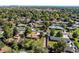 Aerial view showcasing a residential neighborhood with houses and yards at 867 S Everett St, Lakewood, CO 80226