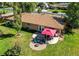 Aerial view of a house with backyard patio and fire pit at 867 S Everett St, Lakewood, CO 80226