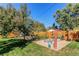 Landscaped backyard with garden area and raised beds at 867 S Everett St, Lakewood, CO 80226