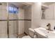 Basement bathroom with a stand-up shower at 867 S Everett St, Lakewood, CO 80226