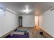 Spacious basement with exercise equipment and extra storage at 867 S Everett St, Lakewood, CO 80226