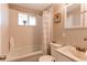 Clean bathroom with shower/tub combo and updated vanity at 867 S Everett St, Lakewood, CO 80226