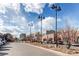 Exterior view of a plaza with parking lot and several shops and restaurants at 867 S Everett St, Lakewood, CO 80226