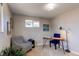 Home office featuring a desk, chair, and patterned armchair at 867 S Everett St, Lakewood, CO 80226