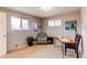 Home office with window light and comfy armchair at 867 S Everett St, Lakewood, CO 80226