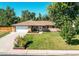 House with a well-maintained lawn and garden at 867 S Everett St, Lakewood, CO 80226