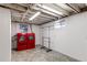 Basement laundry room with red washer and dryer at 867 S Everett St, Lakewood, CO 80226