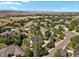 High angle aerial of a neighborhood with stunning mountain views at 5421 Potentilla Ct, Parker, CO 80134