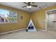 Bedroom with a ceiling fan, window, and plenty of space at 5421 Potentilla Ct, Parker, CO 80134