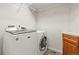 Laundry room featuring a modern washer and dryer at 5421 Potentilla Ct, Parker, CO 80134