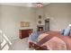 Bright main bedroom featuring a fireplace, tall ceilings and a spacious layout at 5421 Potentilla Ct, Parker, CO 80134