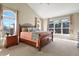 This main bedroom is bright and spacious with two large arched windows at 5421 Potentilla Ct, Parker, CO 80134