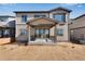 Two story home with backyard and covered patio perfect for entertaining in this private outdoor space at 13398 E 99Th Pl, Commerce City, CO 80022