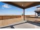 Back patio, ideal for entertaining, overlooks the fenced yard, offering privacy and relaxation in the outdoor space at 13398 E 99Th Pl, Commerce City, CO 80022