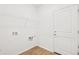 Utility room with wood-look floors and washer/dryer hookups at 9343 Biscay St, Commerce City, CO 80022