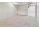 Finished basement with carpet and doorway at 8915 Field St # 118, Broomfield, CO 80021