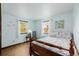 Light-filled bedroom with hardwood floors and charming decor at 37 High View Ln, Boulder, CO 80302