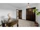 Bedroom featuring neutral paint, closet and dark wood trim at 37 High View Ln, Boulder, CO 80302