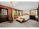 Inviting bedroom with a cozy bed, natural light, and a warm color palette, complemented by views from the windows at 37 High View Ln, Boulder, CO 80302