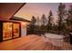 Enjoy outdoor dining on the deck with scenic views and a mountain backdrop at 37 High View Ln, Boulder, CO 80302