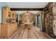 Traditional dining room featuring a stone accent wall and wood beam at 37 High View Ln, Boulder, CO 80302