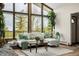 Bright living room features large windows with views and comfortable seating at 37 High View Ln, Boulder, CO 80302