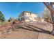 View of the backyard showcasing a deck area, gazebo and a storage shed at 16650 E 107Th Ct, Commerce City, CO 80022
