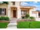 Charming home exterior featuring a well-manicured lawn, front porch and a warm, inviting entrance at 16650 E 107Th Ct, Commerce City, CO 80022