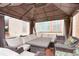 Comfortable outdoor seating in gazebo, perfect for relaxing and entertaining with backyard views at 16650 E 107Th Ct, Commerce City, CO 80022